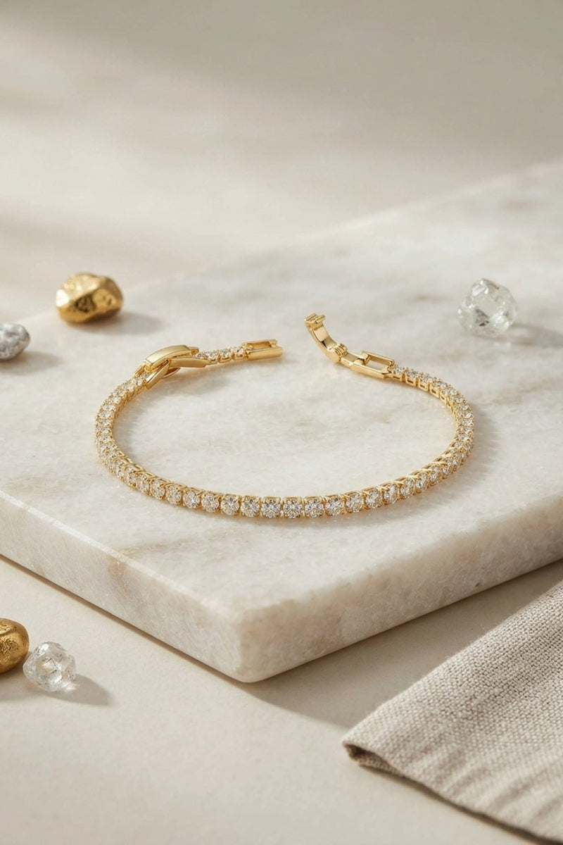 Pirinç Gold Renk İnce Zirkon Taşlı Su Yolu Kadın Bileklik